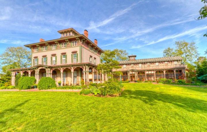 a large house with a large lawn in front of it at Southern Mansion in Cape May