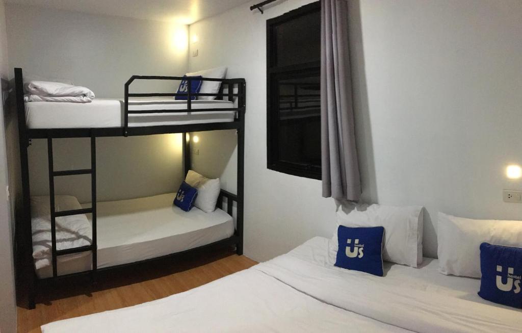 Postel nebo postele na pokoji v ubytování Us hostel samui