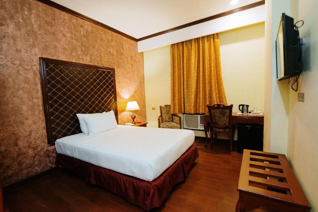 Postel nebo postele na pokoji v ubytování Hotel San Marco