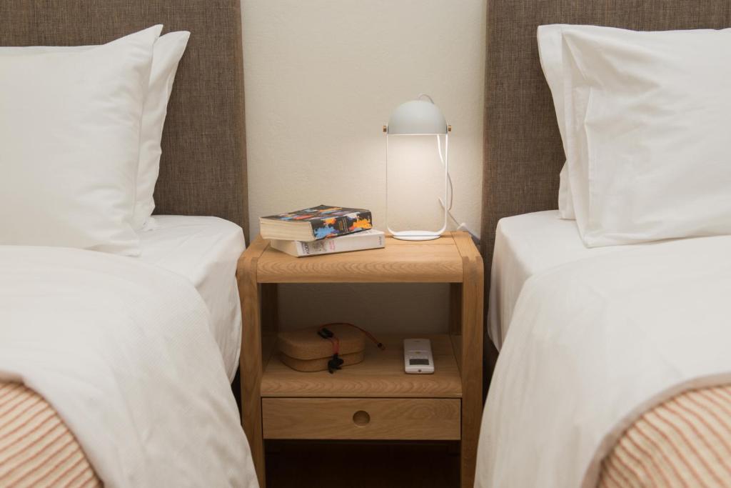 Postel nebo postele na pokoji v ubytování Piraeus Seaview Elegant Apartments