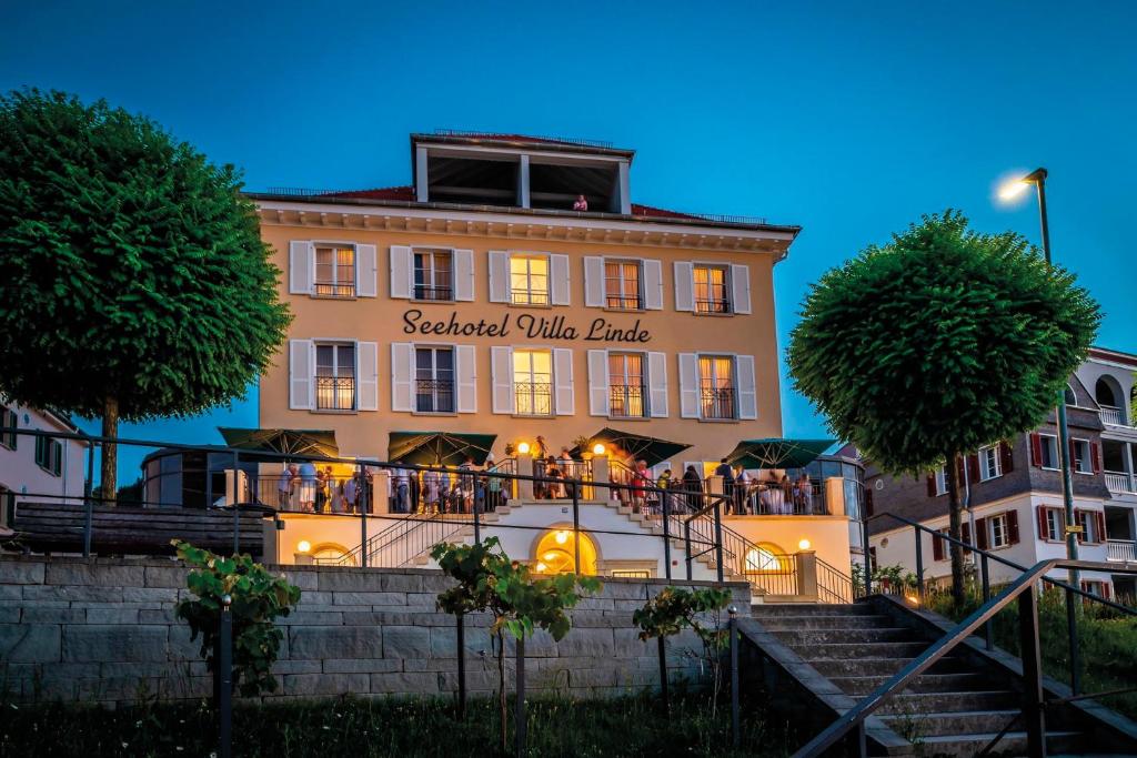 a building with a sign that reads seafood white cartridge at VILLA LINDE Seehotel in Bodman-Ludwigshafen