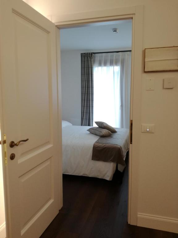 Postel nebo postele na pokoji v ubytování Casa Oliva Quero