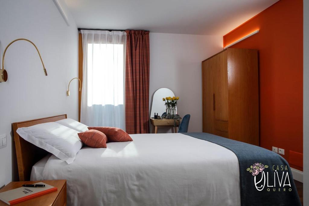 Postel nebo postele na pokoji v ubytování Casa Oliva Quero