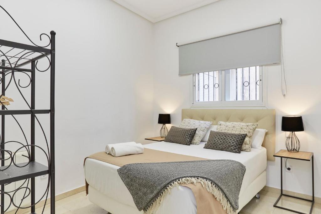 Postel nebo postele na pokoji v ubytování LEEWAYS APARTMENT XVIII in GRAN VÍA