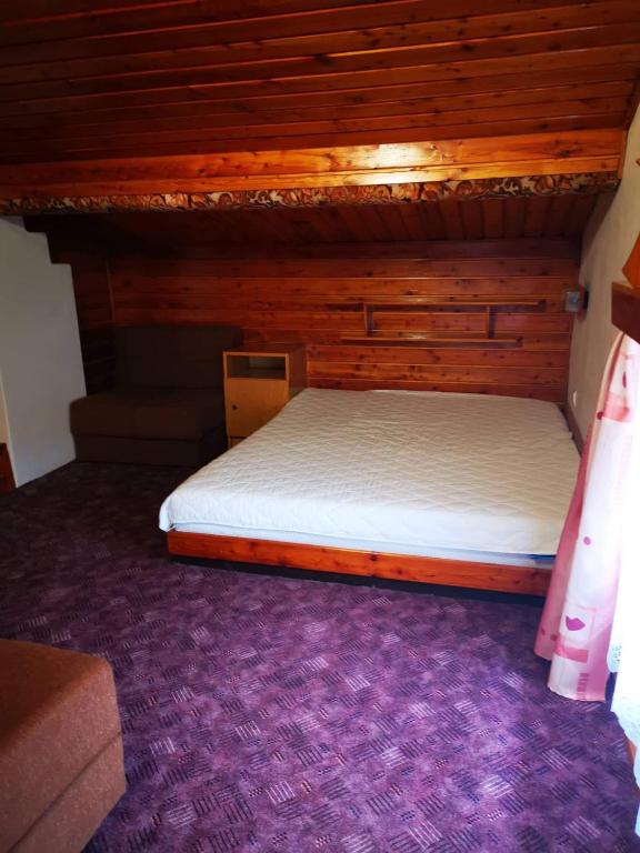 Postel nebo postele na pokoji v ubytování Penzion U Arnošta Skláře