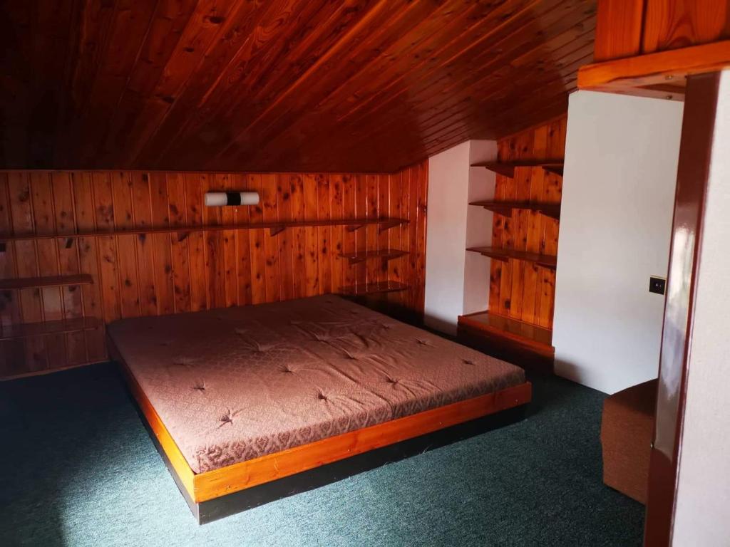 Postel nebo postele na pokoji v ubytování Penzion U Arnošta Skláře