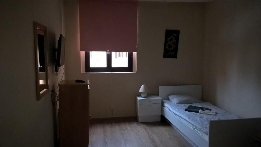 Postel nebo postele na pokoji v ubytování Máté Pension