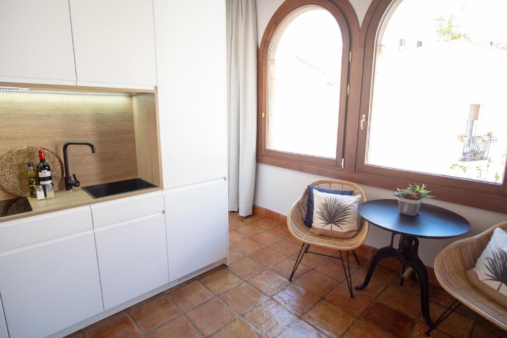Kuchyň nebo kuchyňský kout v ubytování Apartamentos Casa del Aceite