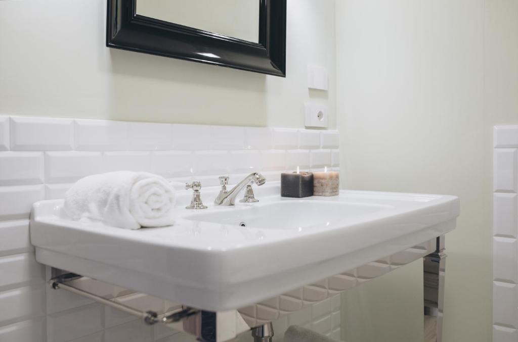 Kúpeľňa v ubytovaní Gregorini Bingham Art Luxury Suites