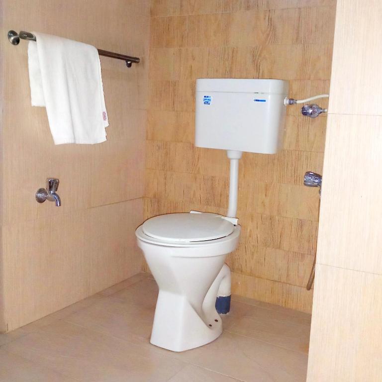 Koupelna v ubytování Hotel Manik Moti