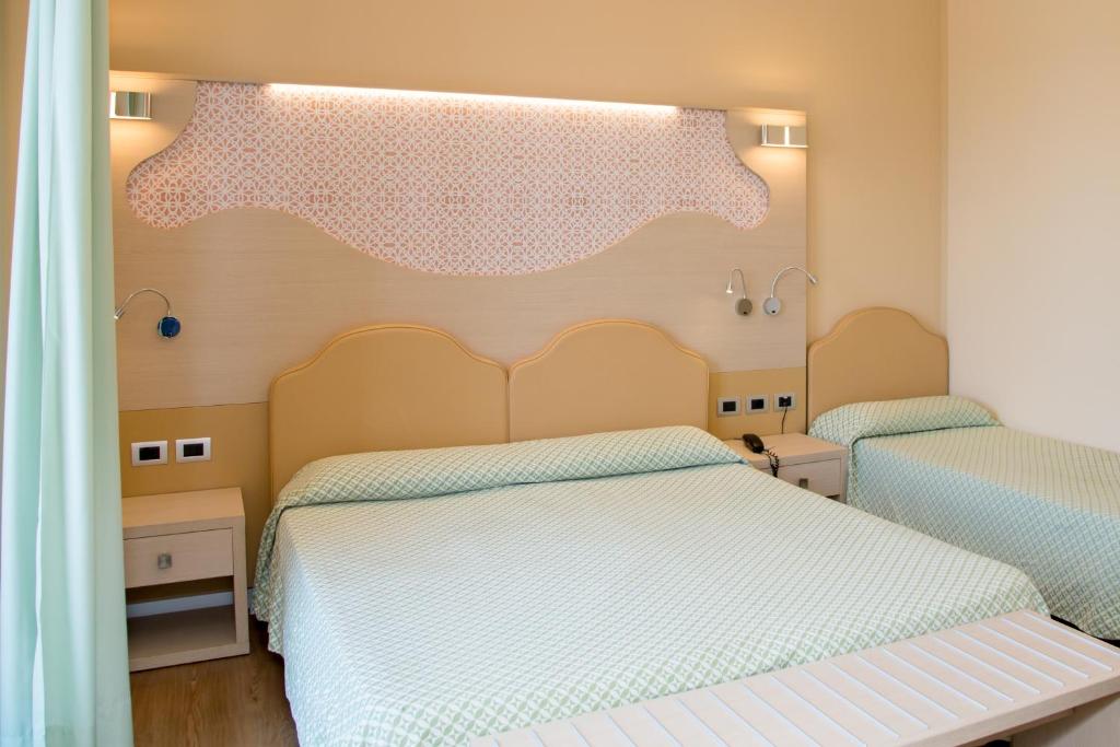 Postel nebo postele na pokoji v ubytování Hotel El Balear