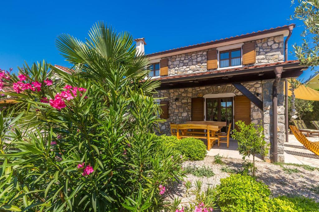 Zahrada ubytování Holiday Home Blue Ivy