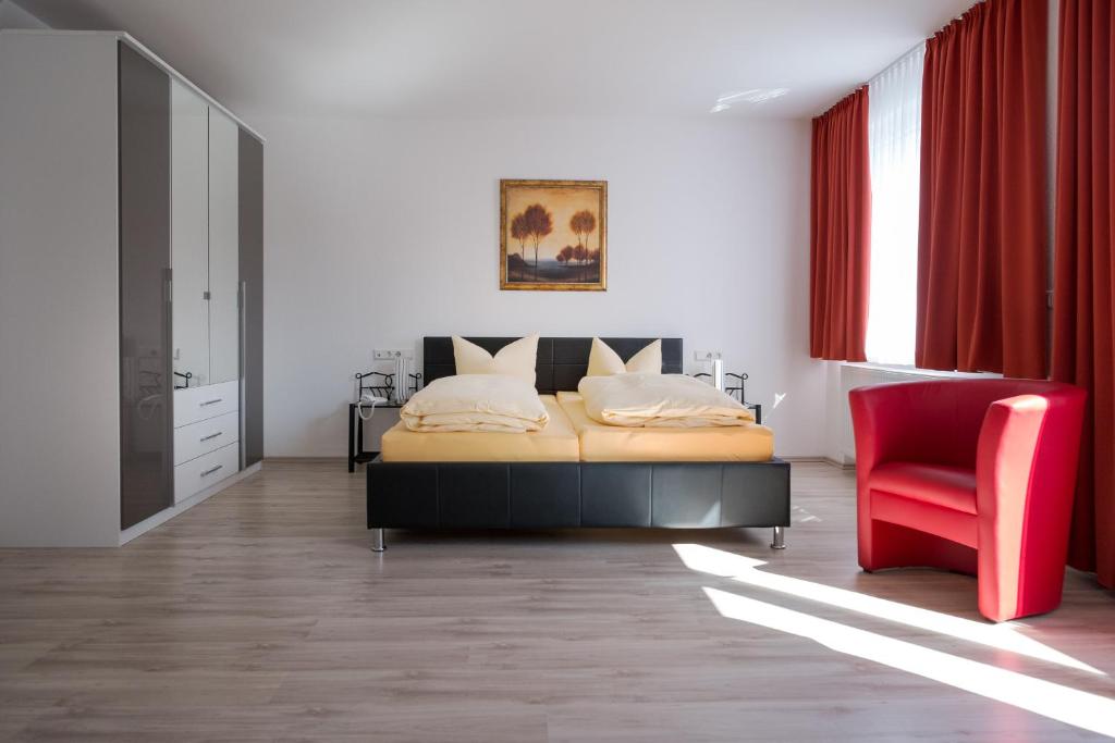 Postel nebo postele na pokoji v ubytování Hotel Nora