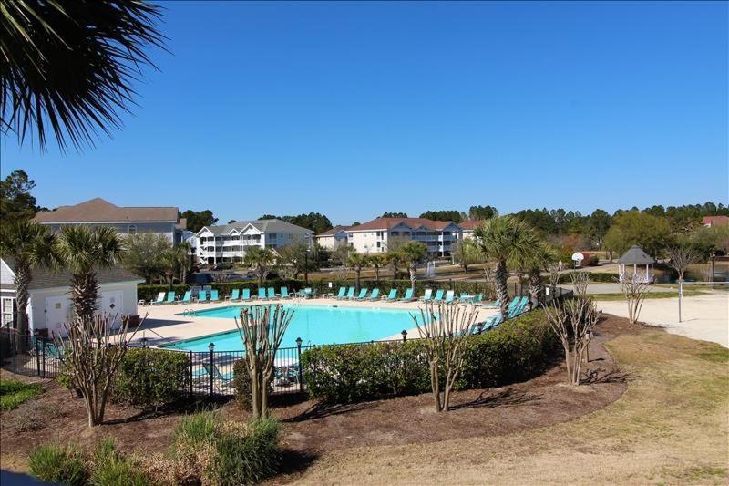 a large swimming pool in a resort at 1633 Ironwood Condo in Myrtle Beach