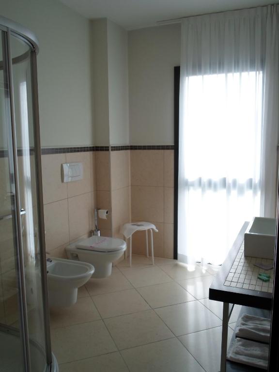 Koupelna v ubytování Hotel Le Macine