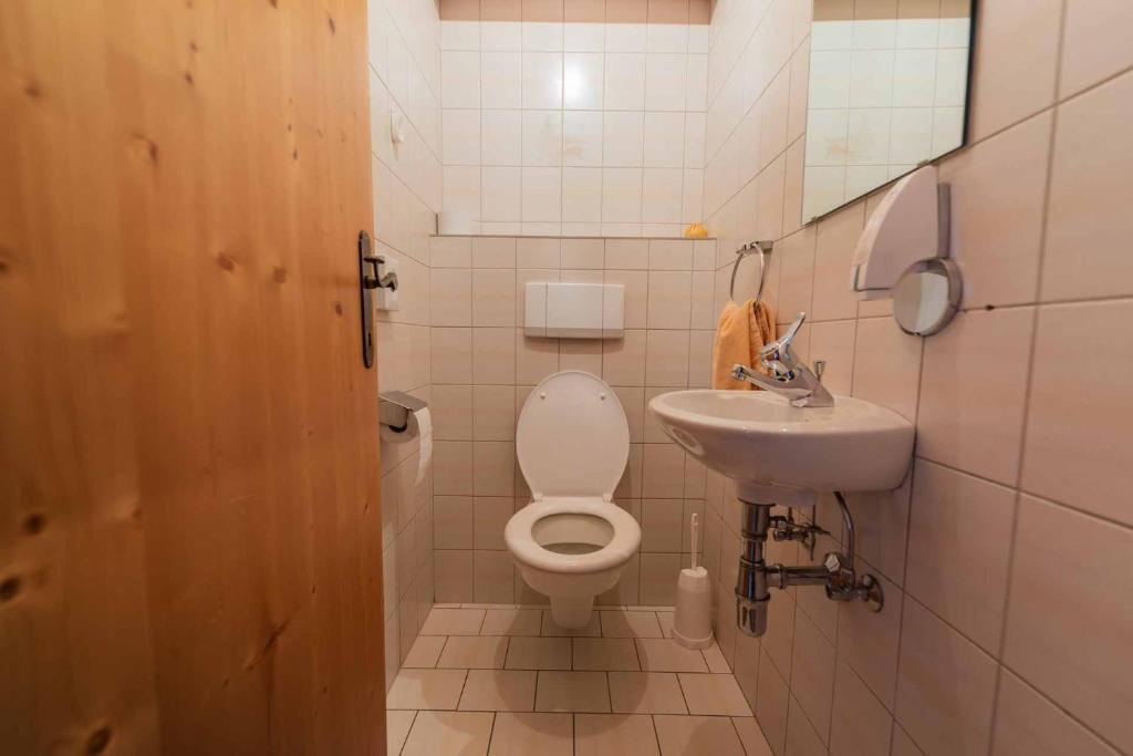 Koupelna v ubytování Hotel Garni Pfandl