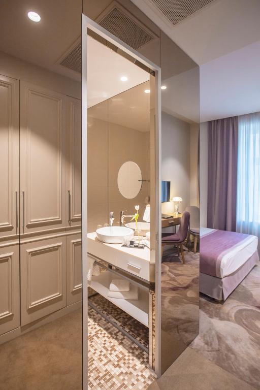 Ένα ή περισσότερα κρεβάτια σε δωμάτιο στο Jump INN Hotel Belgrade