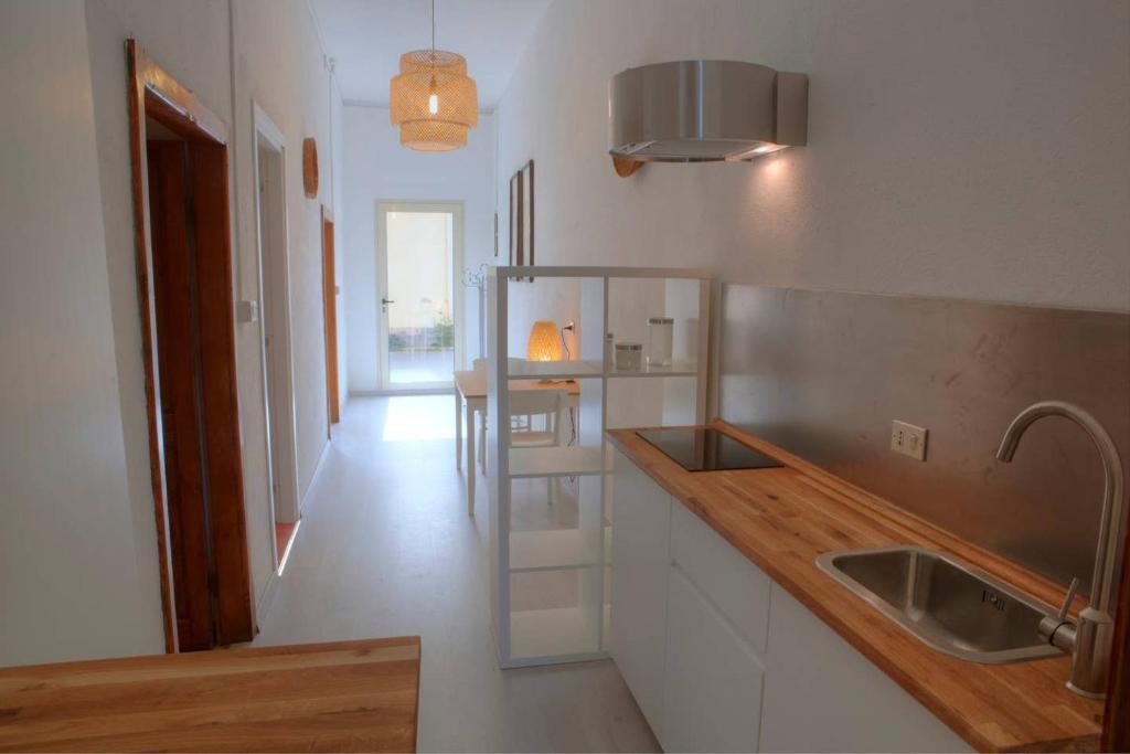 Casa dei Pescatori a Càbras - Autentico Appartamento