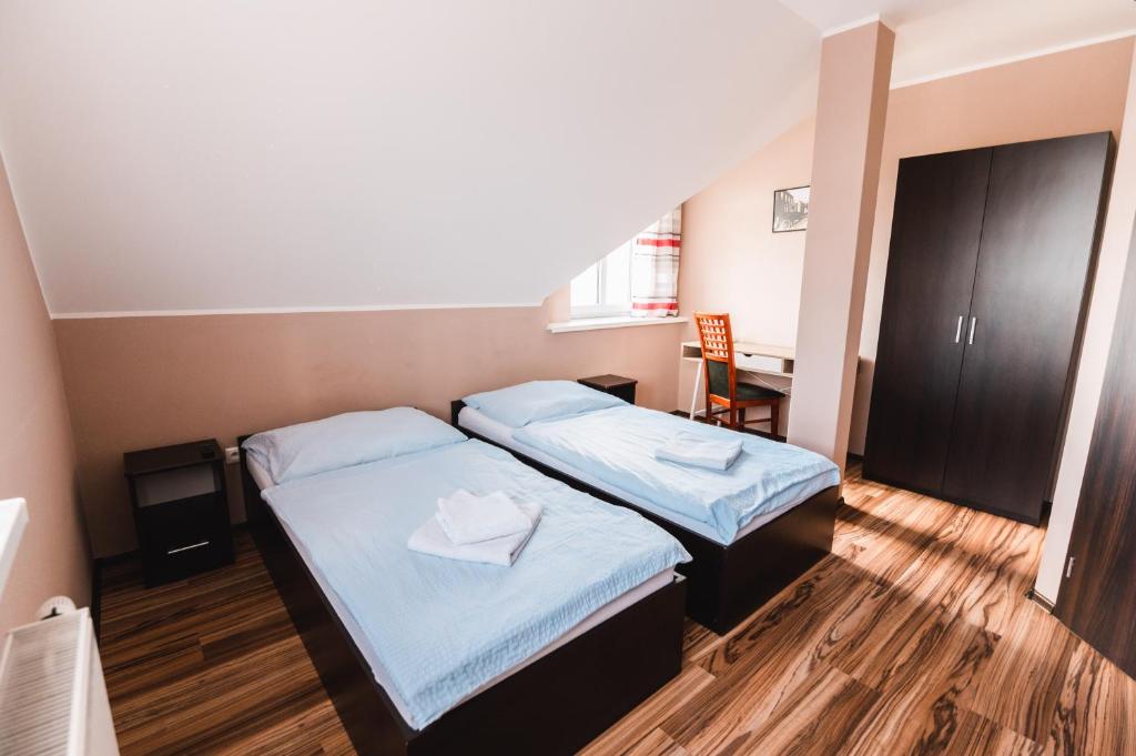 Postel nebo postele na pokoji v ubytování Motel ARD
