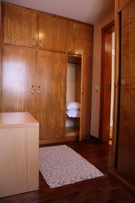 Uma cama ou camas num quarto em Alojamento Santa Clara