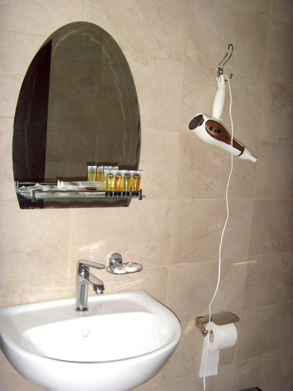 Koupelna v ubytování Hotel NADIKVARI