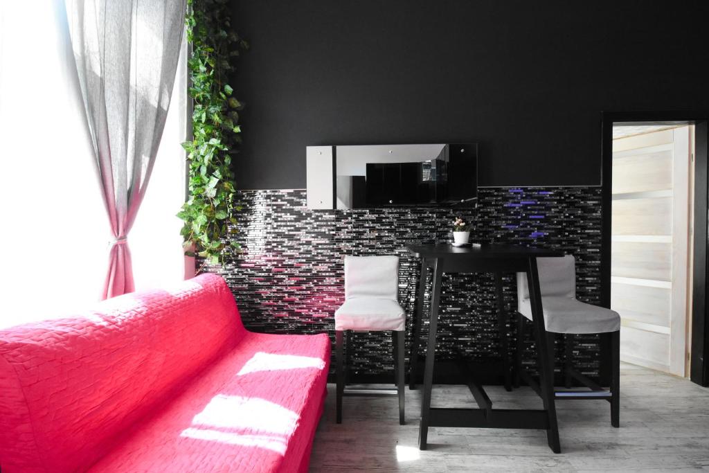 Posedenie v ubytovaní Modern Design Apartment in the City Center