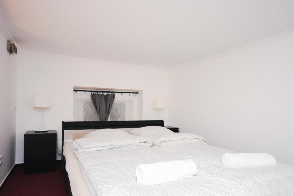 Posteľ alebo postele v izbe v ubytovaní Modern Design Apartment in the City Center