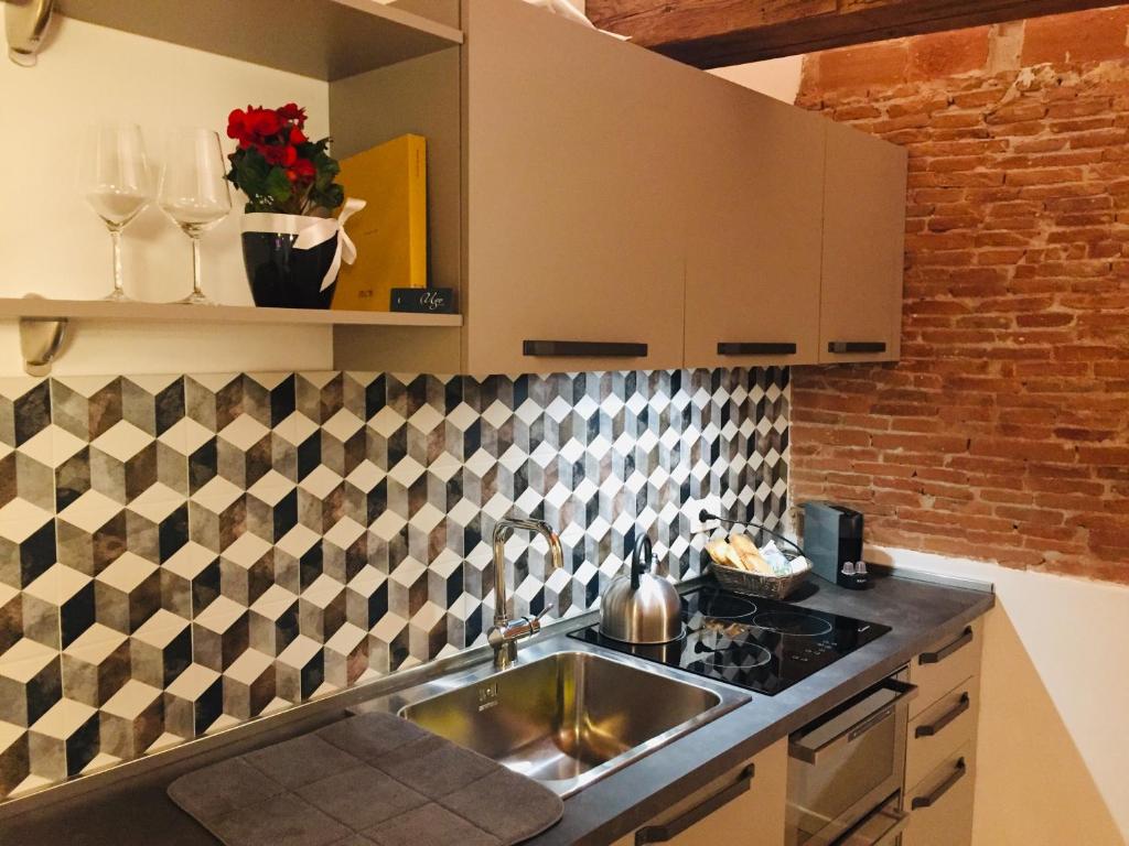 Kuchnia lub aneks kuchenny w obiekcie UnicumHouse Verona