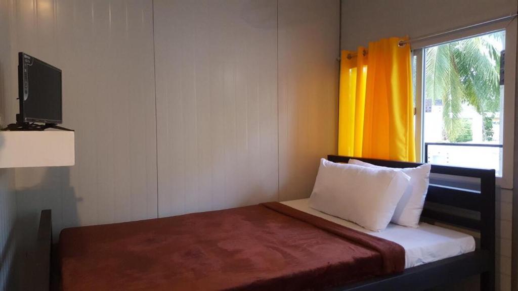 Postel nebo postele na pokoji v ubytování Dormitelsph Cloud 9
