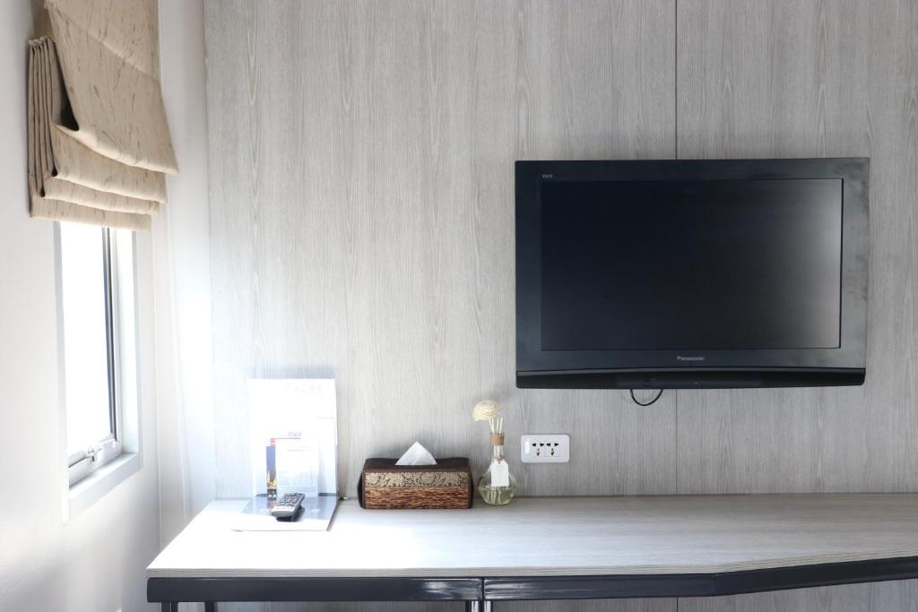 TV a/nebo společenská místnost v ubytování The Mini R Ratchada