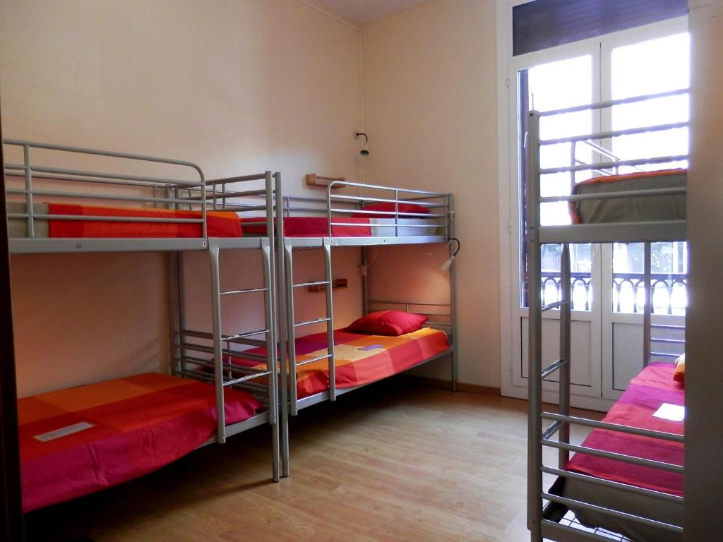 Postel nebo postele na pokoji v ubytování Barcelona Central Garden Hostal