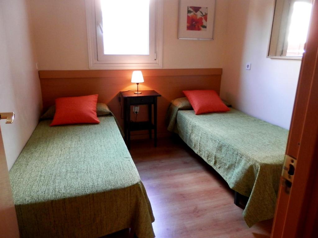 Postel nebo postele na pokoji v ubytování Barcelona Central Garden Hostal