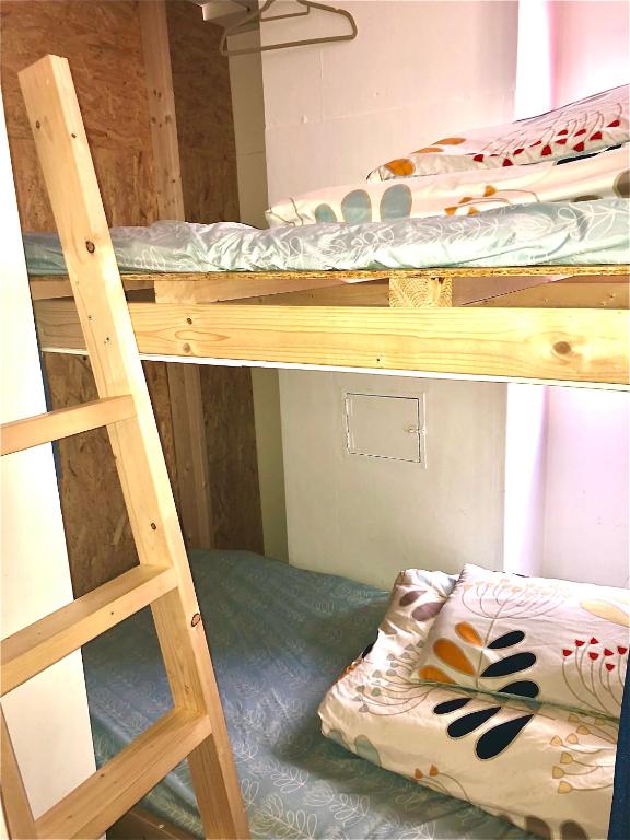 Postel nebo postele na pokoji v ubytování Cloud Sharing Hotel Hakata 1 Guesthouse Dormitory