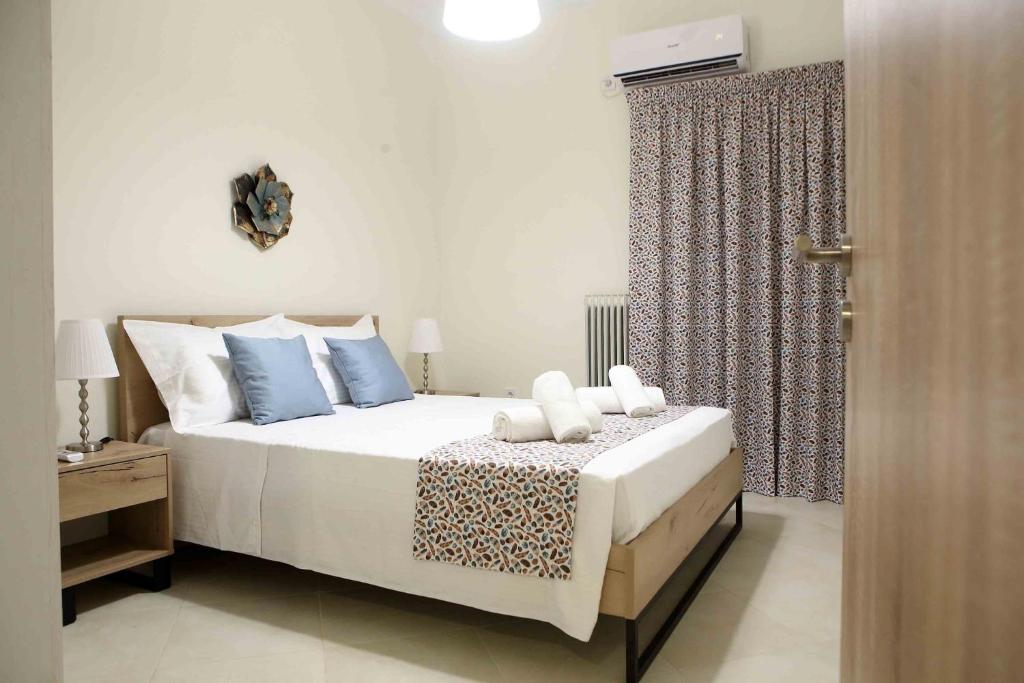 Posteľ alebo postele v izbe v ubytovaní Best House, Anakreontos, Perivolaki, Nikaia, P...