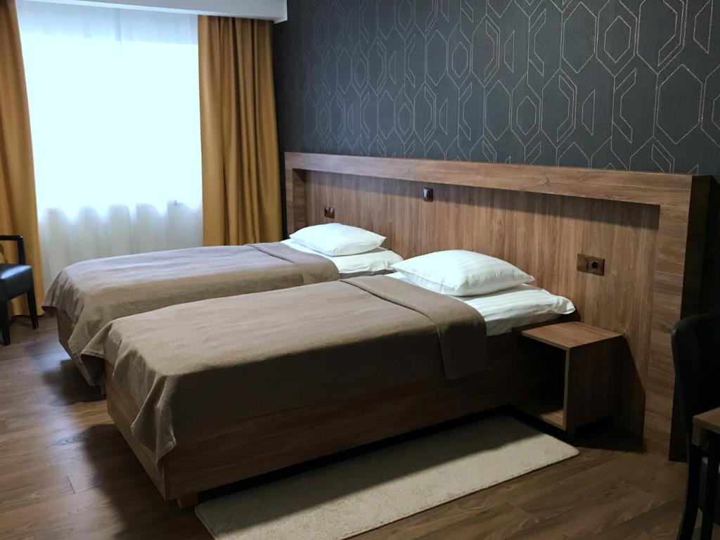 Postel nebo postele na pokoji v ubytování Hotell Wesenbergh