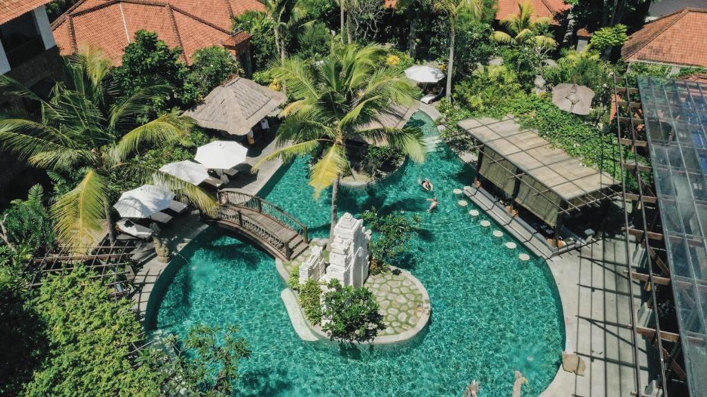 an aerial view of a swimming pool at a resort at The Alantara Sanur in Sanur