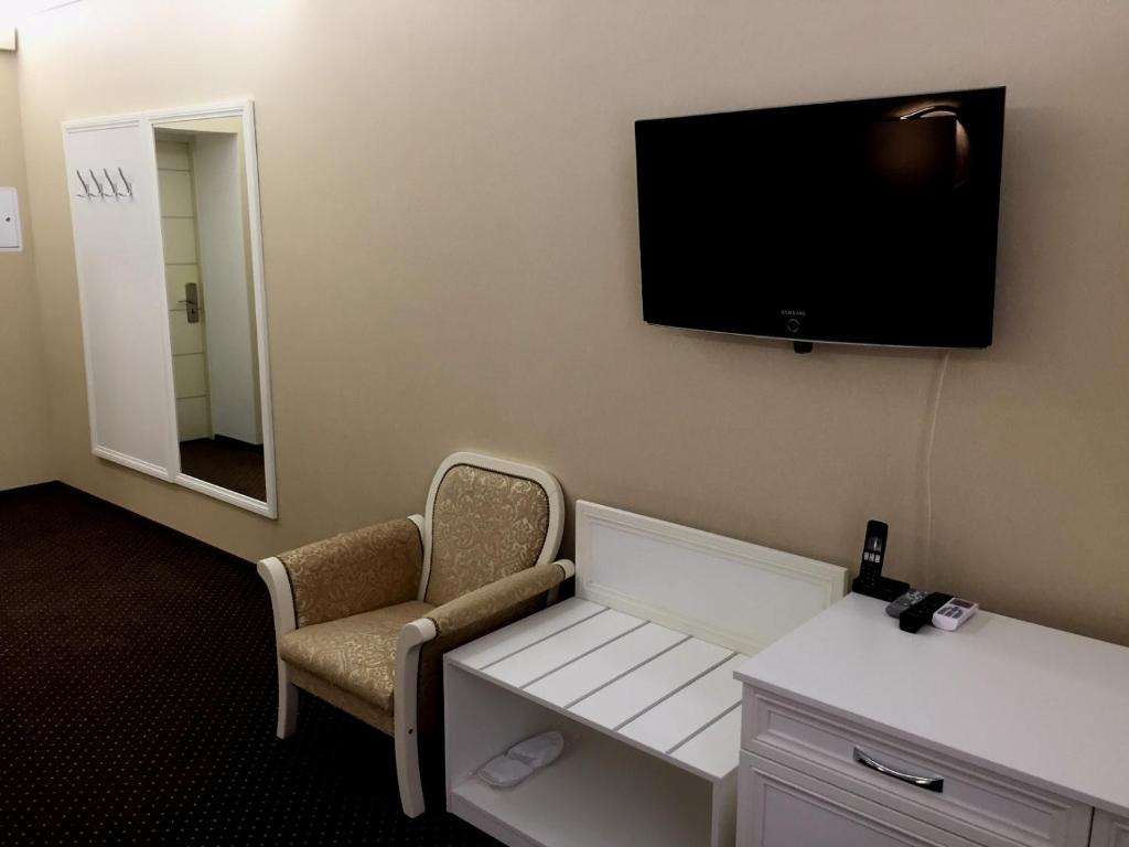 TV a/nebo společenská místnost v ubytování Hotel Obolon