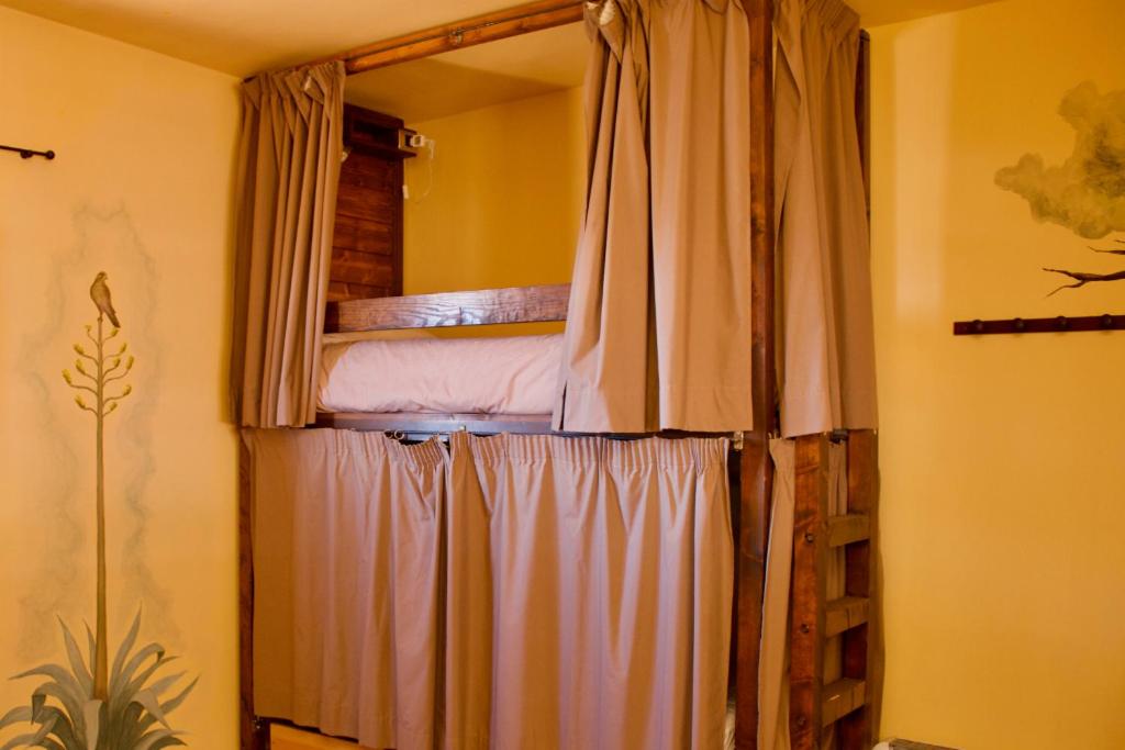 Postel nebo postele na pokoji v ubytování Refugio El Hornillo