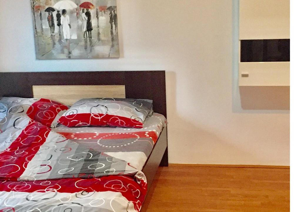 Postel nebo postele na pokoji v ubytování DUŠICA APARTMANI