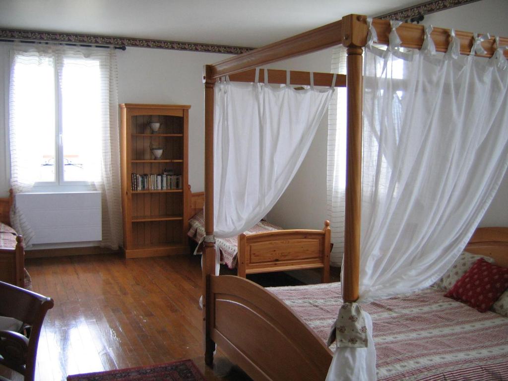 Postel nebo postele na pokoji v ubytování La Maison Jaune