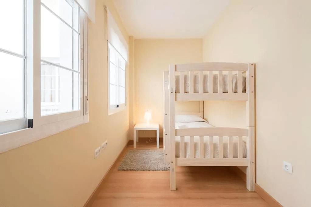 Posteľ alebo postele v izbe v ubytovaní Shiny Lud Family Apartment