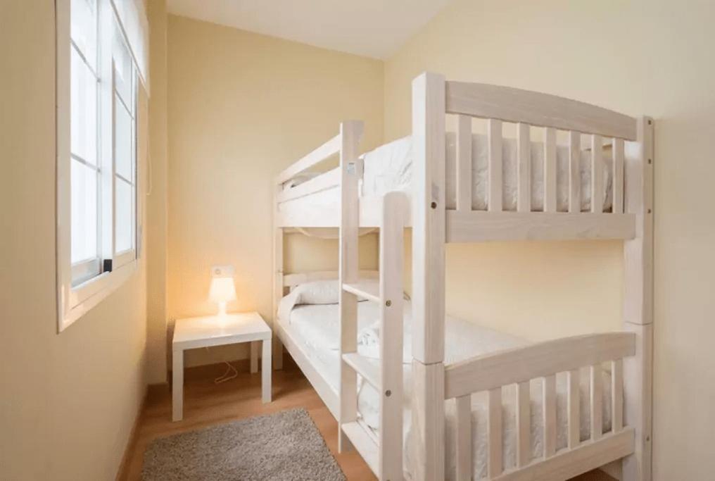Posteľ alebo postele v izbe v ubytovaní Shiny Lud Family Apartment