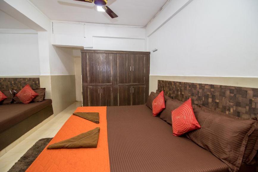 Postel nebo postele na pokoji v ubytování Travo Suites Panjim