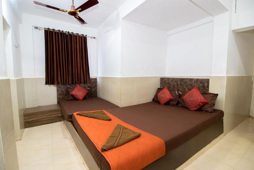 Postel nebo postele na pokoji v ubytování Travo Suites Panjim
