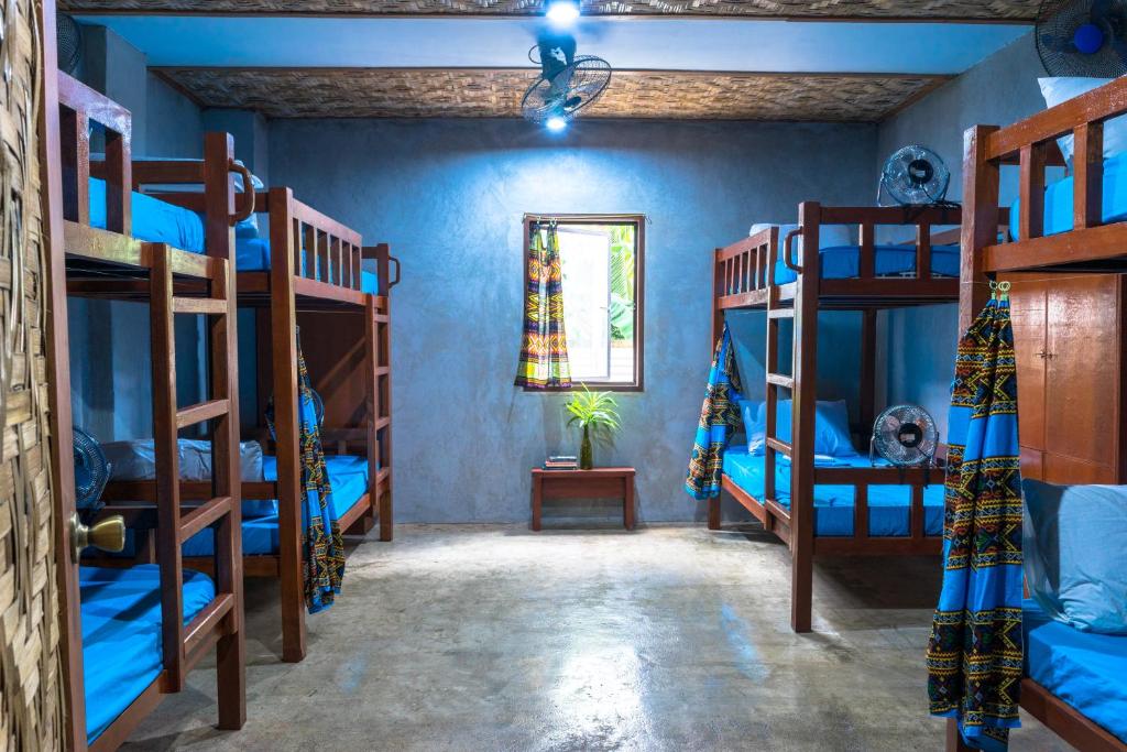Voodi või voodid majutusasutuse Sinag Hostel toas