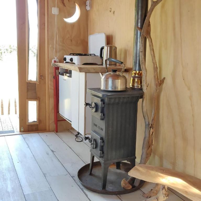 Kuchyň nebo kuchyňský kout v ubytování Pipowagen Overnachting Het Houten Huis