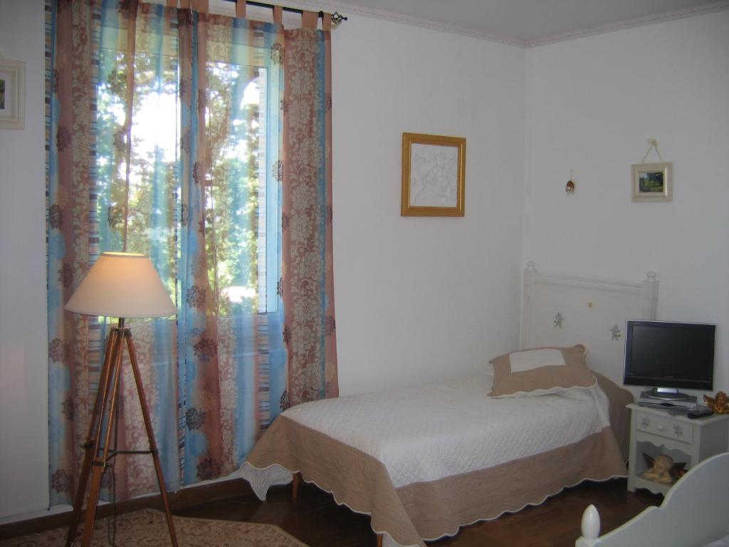 Postel nebo postele na pokoji v ubytování La Maison Jaune
