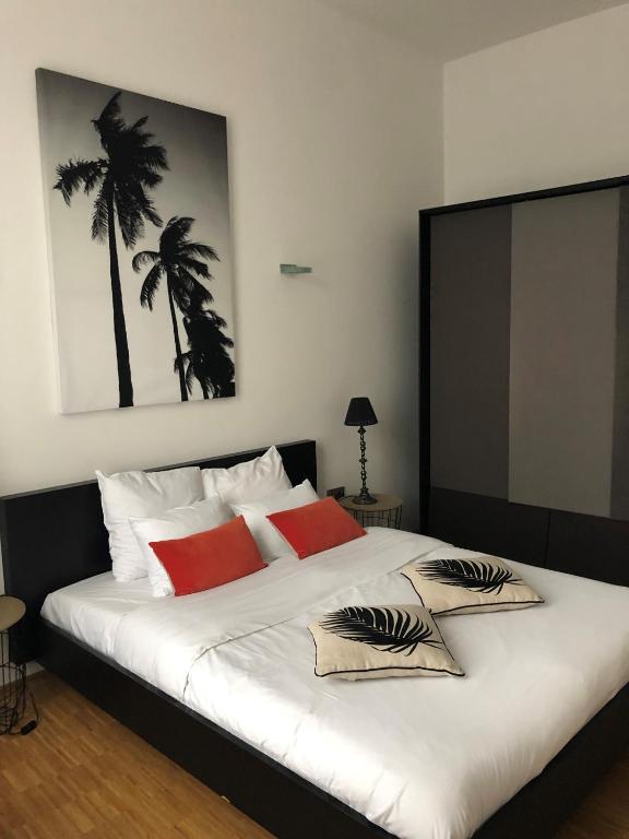 Postel nebo postele na pokoji v ubytování Hotel Vauban