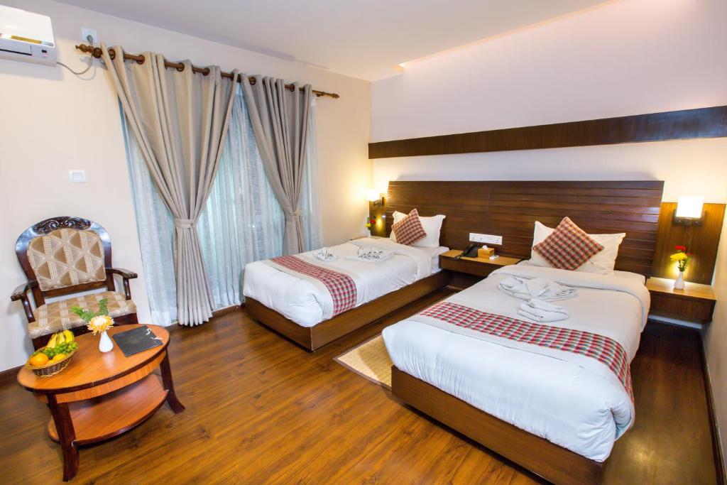 Postel nebo postele na pokoji v ubytování Kathmandu Suite Home