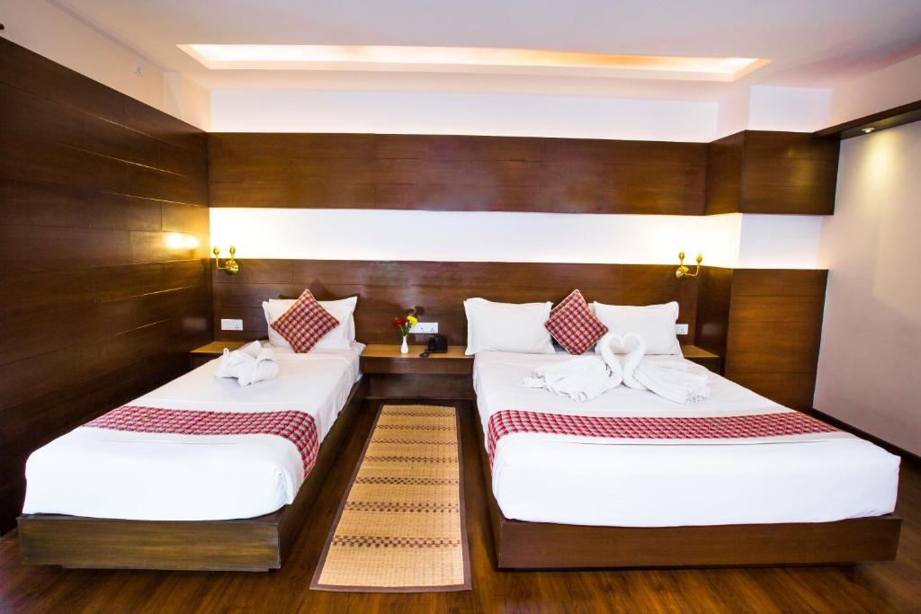 Postel nebo postele na pokoji v ubytování Kathmandu Suite Home
